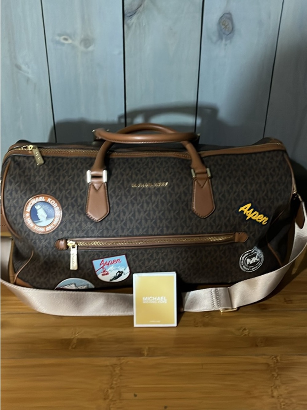 Michael Kors Brown Logo Canvas Weekender with Tan Trim and Aspen Patch